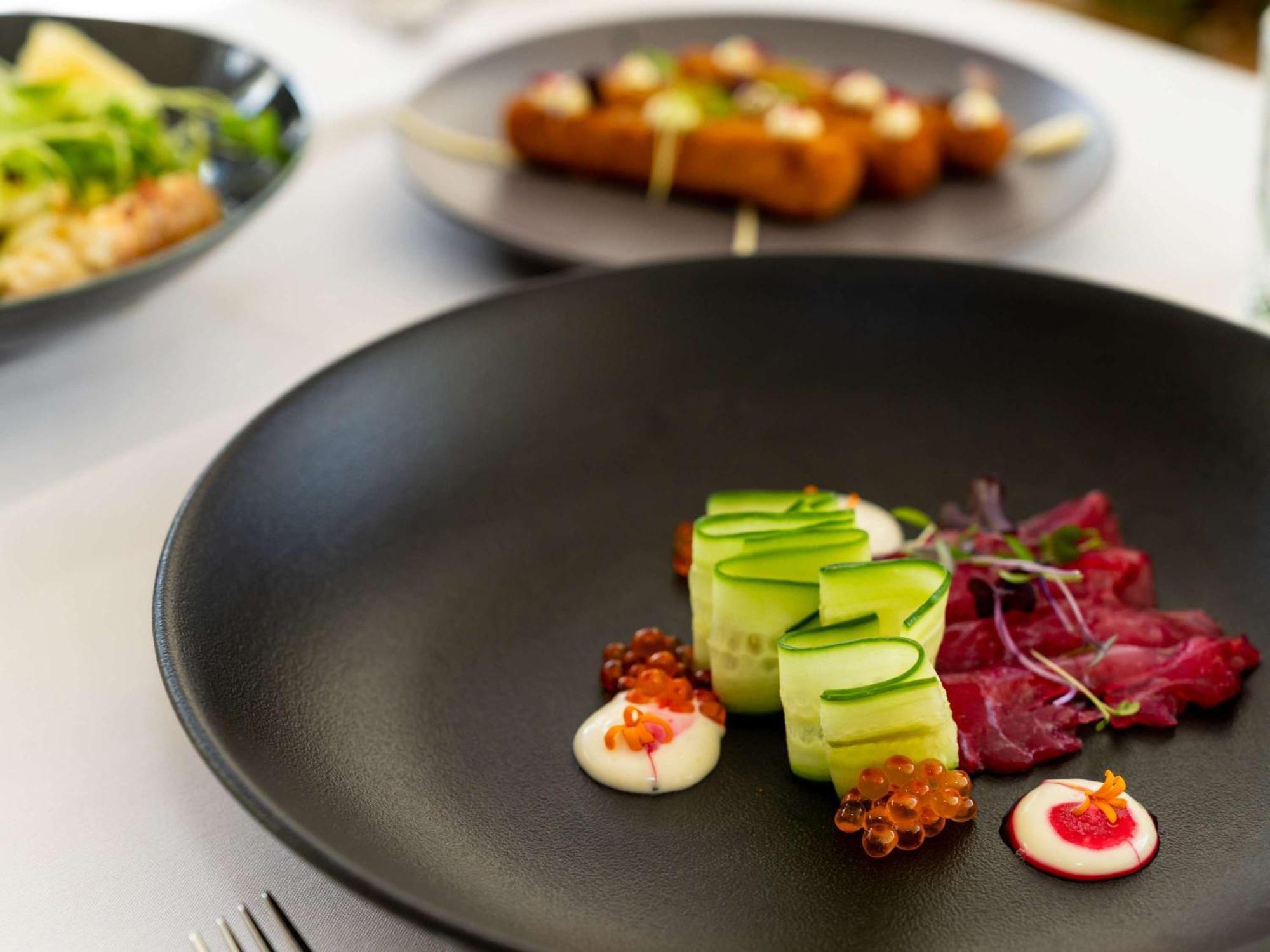 Pullman Cairns International Hotel Luaran gambar A plate of food at the restaurant