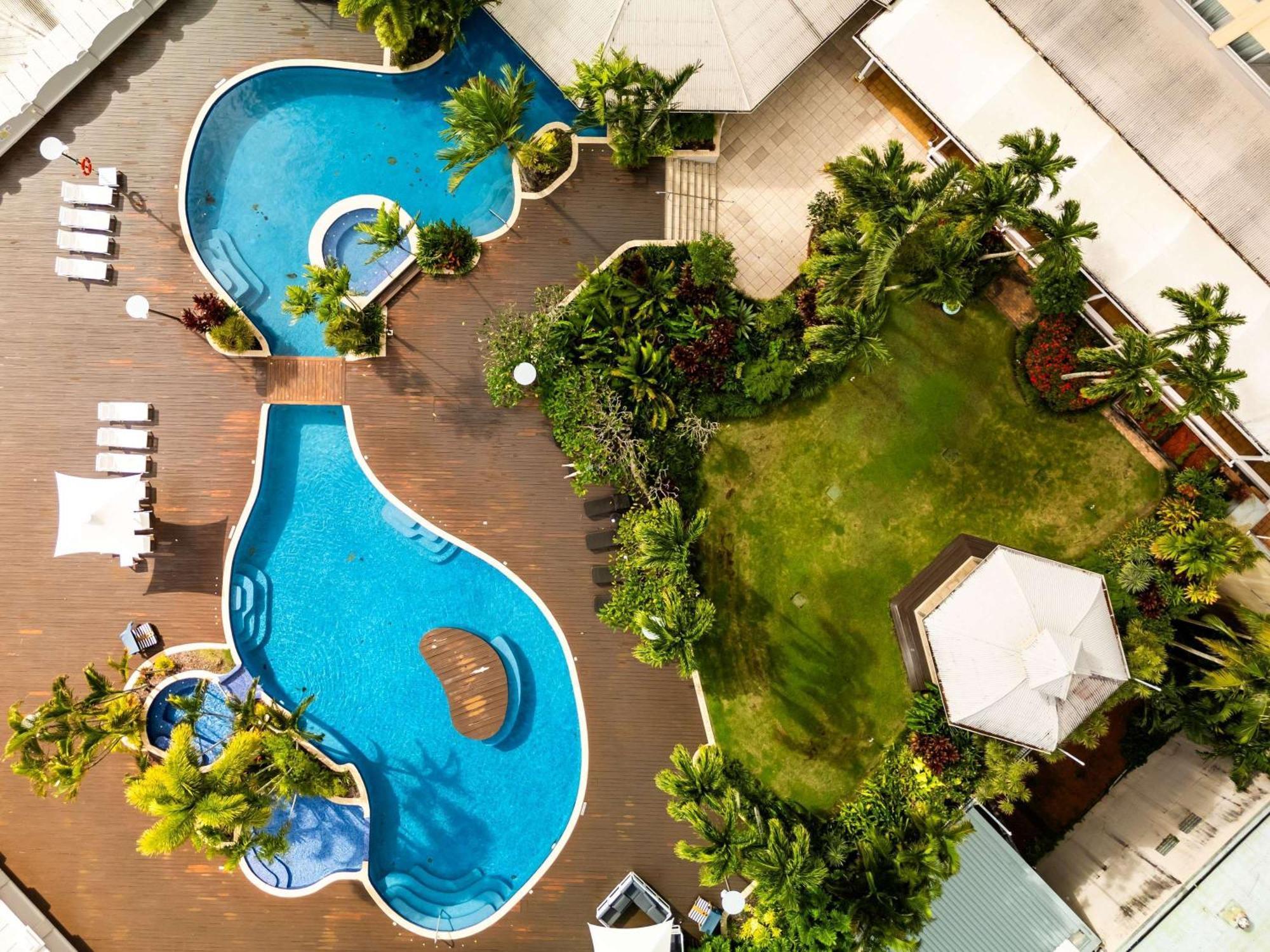 Pullman Cairns International Hotel Luaran gambar The swimming pool at the hotel